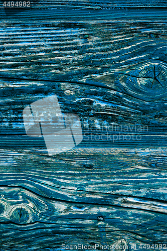 Image of Old wooden blue door texture.