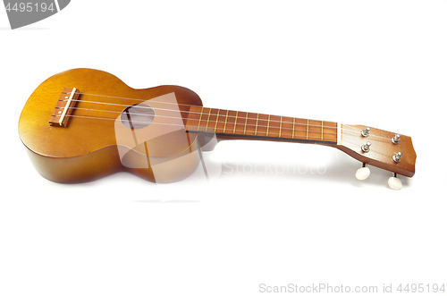 Image of Brown ukulele guitar