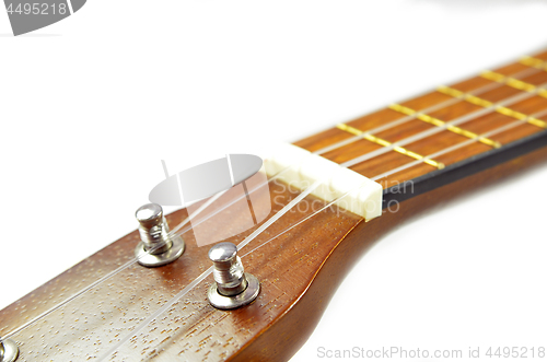 Image of Brown ukulele guitar