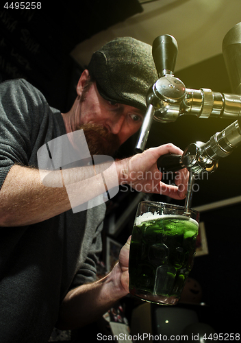 Image of Pouring the green beer