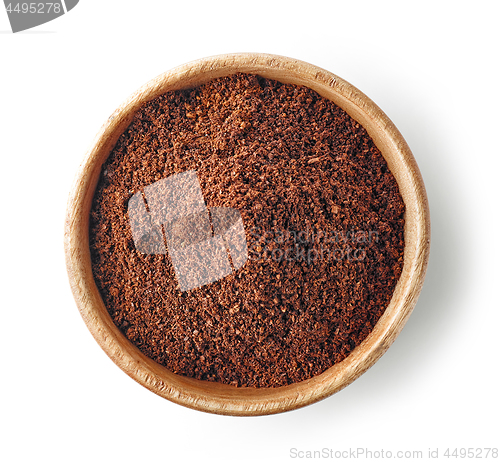 Image of wooden bowl of ground coffee