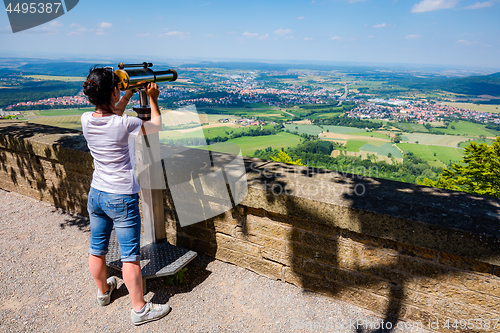 Image of Woman tourist on the observation deck, viewing platform Hohenzol