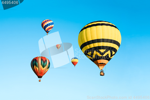 Image of Colorful hot air balloons in the blue sky