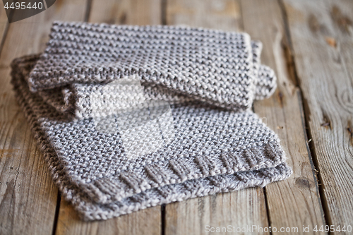 Image of Beige knitted wooden scarf