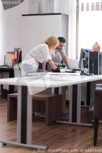 Image of designers in office at the wooden furniture manufacture