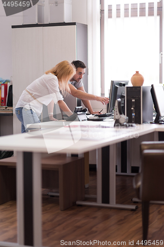 Image of designers in office at the wooden furniture manufacture