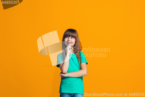 Image of Young serious thoughtful teen girl. Doubt concept.