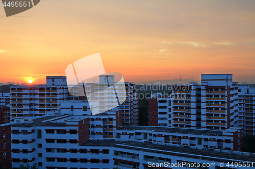 Image of Apartment building at sunset block of flats