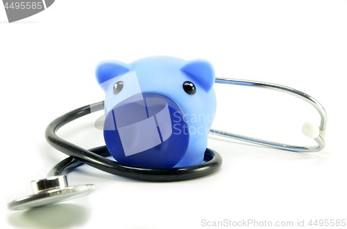 Image of Stethoscope and piggy bank