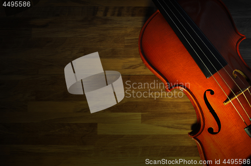 Image of Violin on rustic wooden background