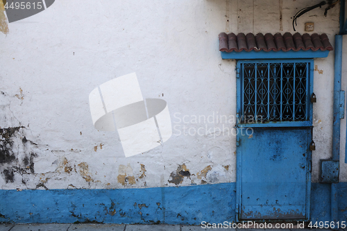 Image of Old building with interesting blue door