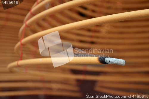 Image of Circular incenses burning in Chinese temple