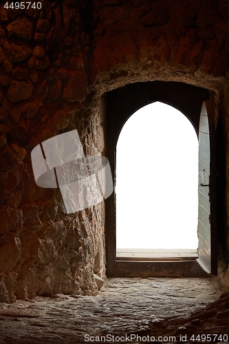 Image of Passage of an old castle, open door