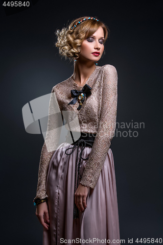 Image of Beautiful girl in lace silk dress