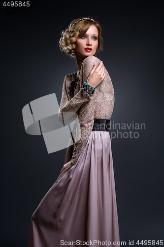 Image of Beautiful girl in lace silk dress