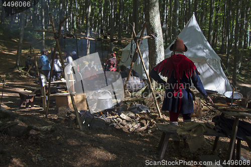 Image of Medieval Camp in the forest cooking in the kettle