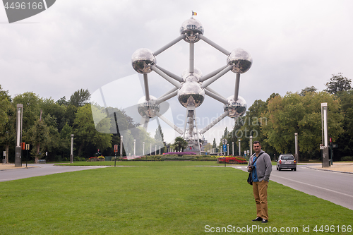 Image of portrait of man in front of atomium building in Brussels