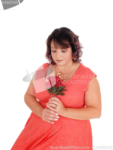 Image of Portrait of big woman with rose