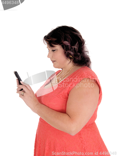 Image of Oversized woman dealing on her cell phone
