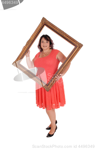 Image of Big woman holding a picture frame