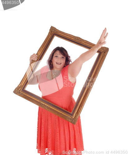 Image of Heavy middle age woman in a red dress 