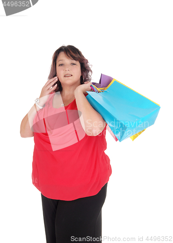 Image of Overweight woman holding her shopping bag's