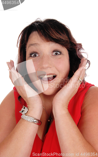 Image of Surprised woman with hands on her face