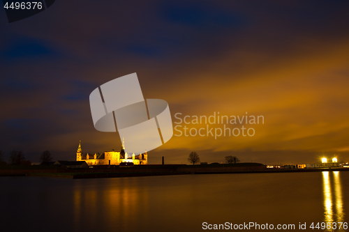 Image of Kronborg Castle at night seen from Elsinore harbour