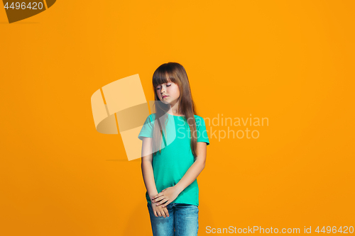 Image of Young serious thoughtful teen girl. Doubt concept.