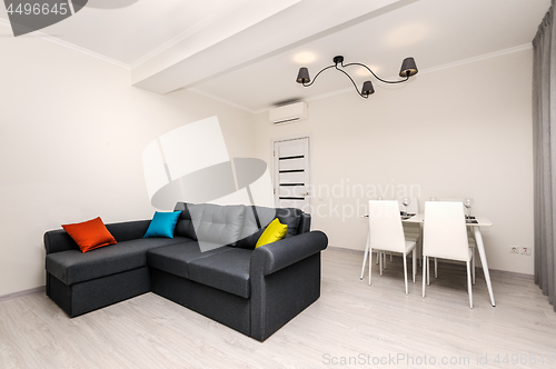 Image of Modern white and gray living room interior