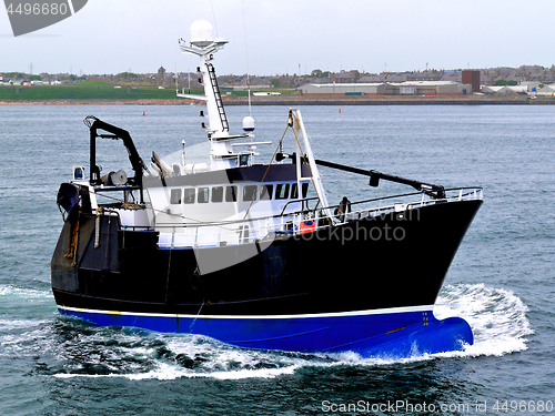 Image of Fishing Boat Leaving Harbour.