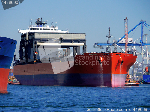 Image of Red Cargo Ship.
