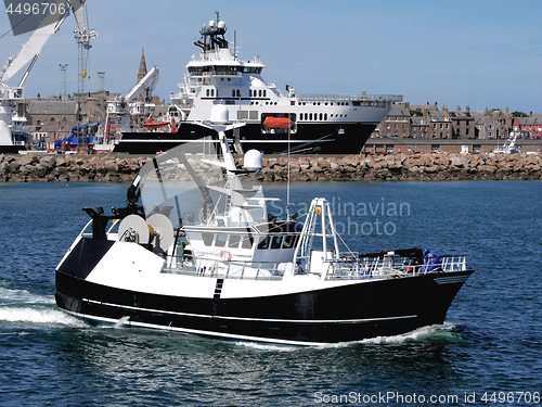 Image of Fishing Vessel Leaving Harbour.