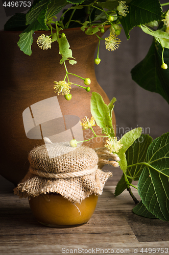 Image of Jar with white honey on the table,close-up