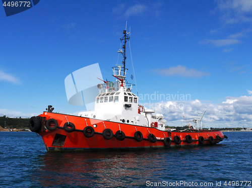 Image of Red Tug Anchored.