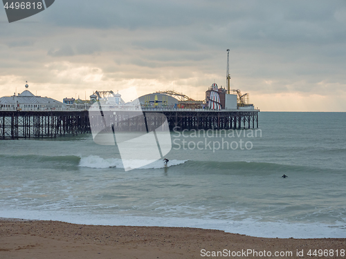 Image of Surfers Near Brighton Pier During December