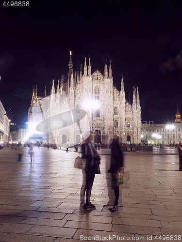 Image of editorial Duomo Milan night tourists