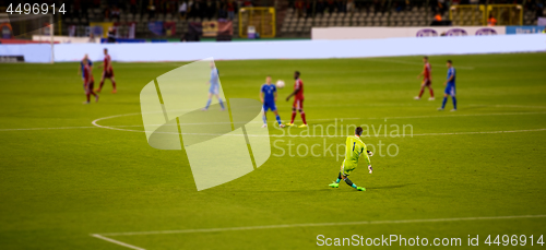 Image of Soccer goalkeeper kicks out the ball