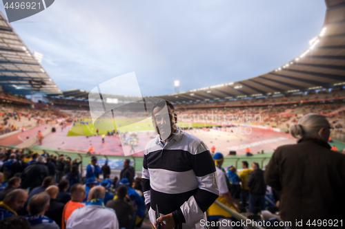 Image of portrait of a male football fan