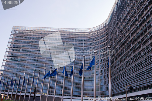 Image of European flags in front of the Berlaymont building