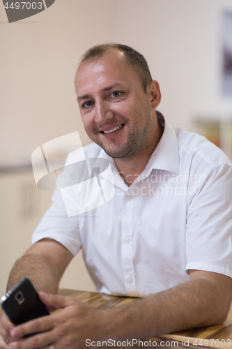 Image of designer in his furniture manufacturing workshop