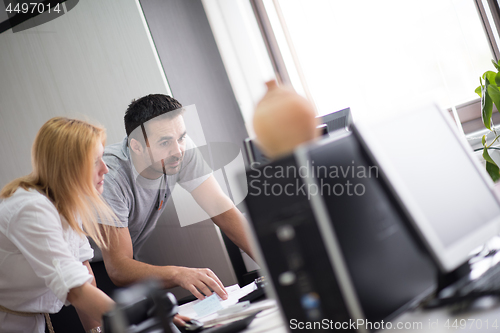 Image of designers in office at the wooden furniture manufacture