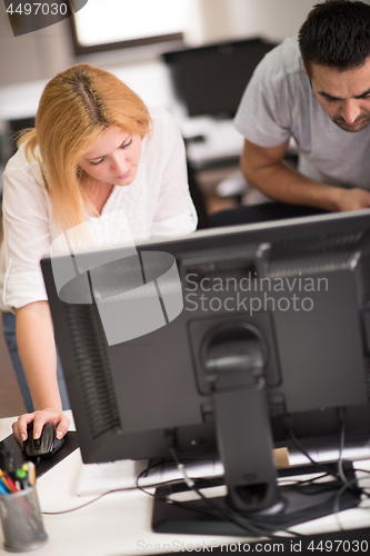 Image of designers in office at the wooden furniture manufacture
