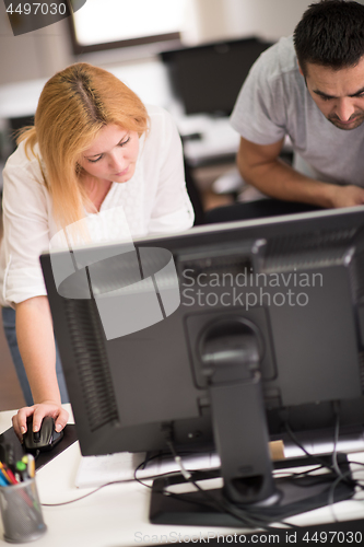 Image of designers in office at the wooden furniture manufacture