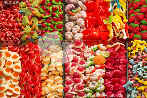 Image of Assorted gummy candies on the street market