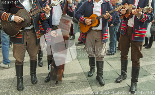 Image of Croatian musicians in traditional Slavonian costumes