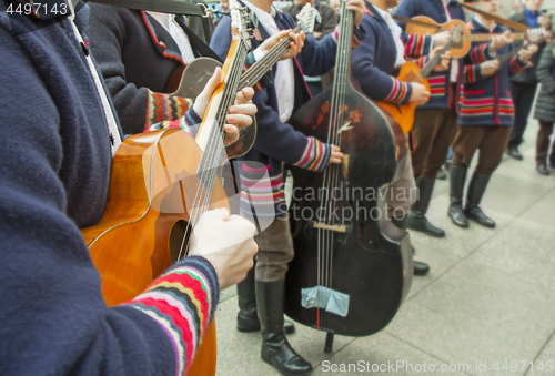 Image of Croatian musicians in traditional Slavonian costumes