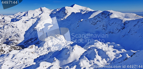 Image of Panoramic view of the snowy mountains ski resort Vogel in Sloven