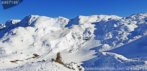 Image of Panoramic view of the snowy mountains ski resort Vogel in Sloven