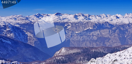 Image of Panoramic view of the snowy mountains ski resort Vogel in Sloven